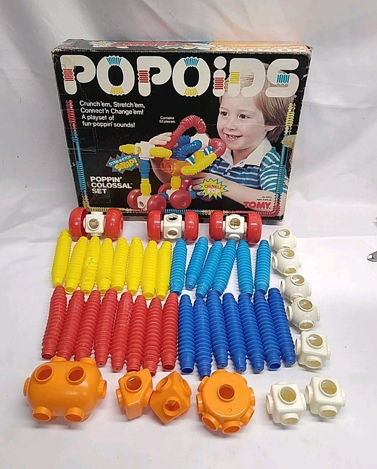 Photo of a vintage set of Popoids, a 1980s plastic construction toy.